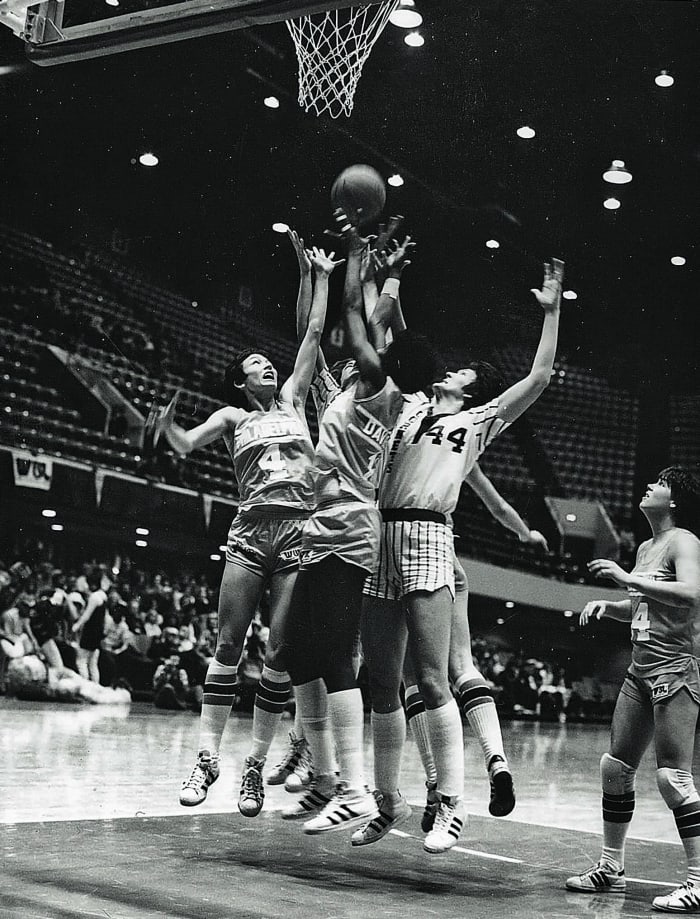 Kunzmann (No. 44, with the Cornets) built her reputation not by making baskets but by sticking her nose in every scrap to help her team.